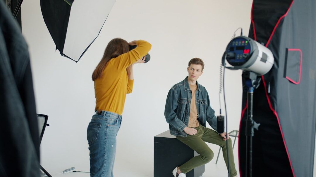 Two people recording a podcast interview in a professional studio