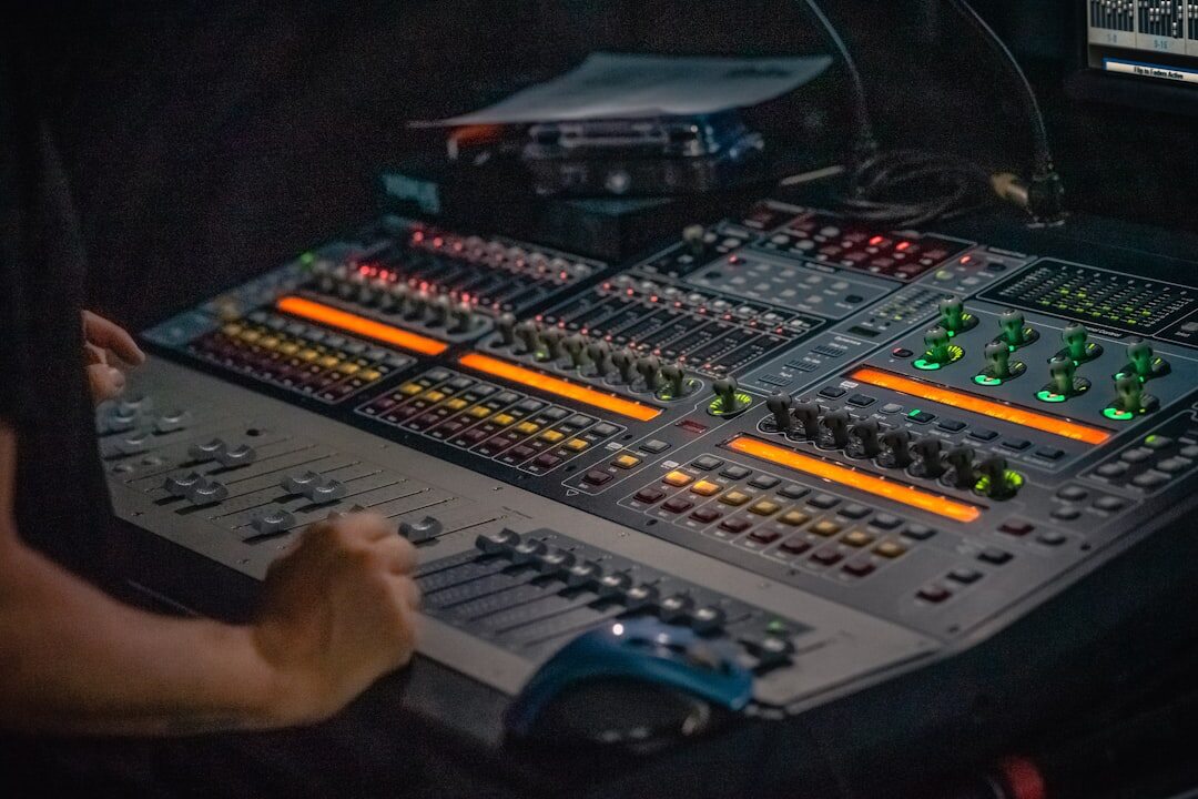Professional audio recording equipment, microphone and mixer close-up